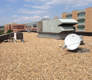 A roofing company in Alexandria VA installs satellite dishes on roofs.